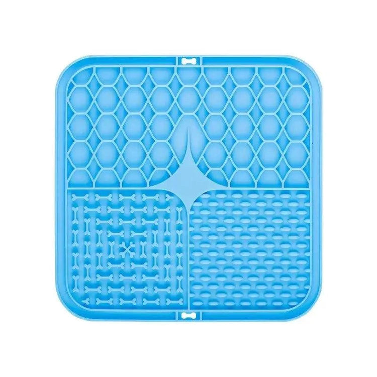 Tapis de léchage en silicone coloré avec ventouse pour chien, favorisant alimentation lente et calme pendant le bain